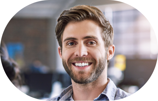 Smiling male professional embodying the success and satisfaction derived from Enstead's lead generation services and virtual assistance solutions
