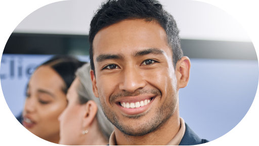 Smiling male professional embodying the success and satisfaction derived from Enstead's lead generation services and virtual assistance solutions